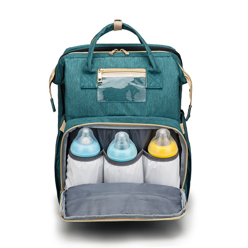 3-in-1 Diaper Bag Backpack with Foldable Baby Bed & USB Port – Large Capacity Travel Bassinet (Free Shipping 3–7 Days)