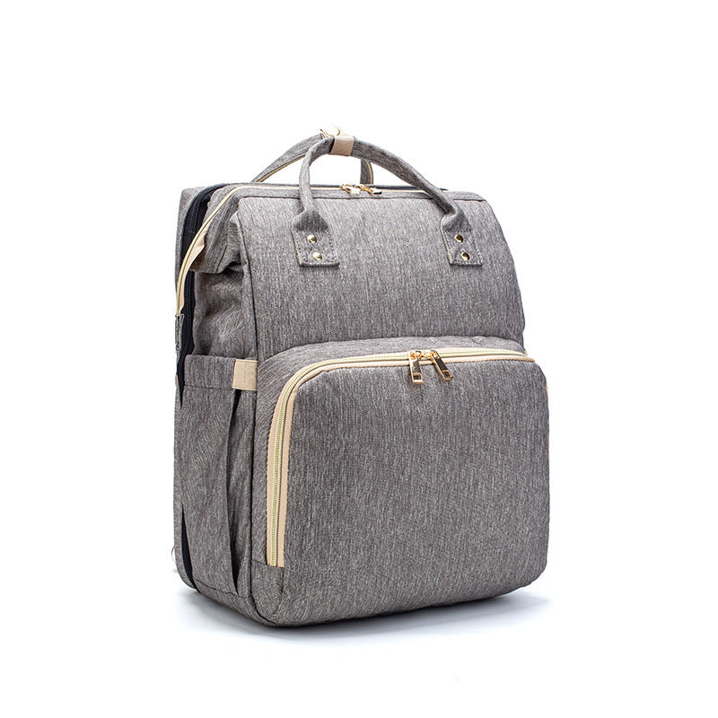 3-in-1 Diaper Bag Backpack with Foldable Baby Bed & USB Port – Large Capacity Travel Bassinet (Free Shipping 3–7 Days)